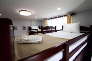 Ein Bett oder Betten in einem Zimmer der Unterkunft Chean-Chean House