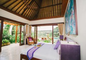Postel nebo postele na pokoji v ubytování Heaven in Bali + 37 fotografií
