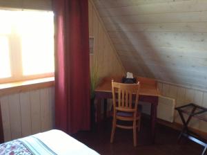 Postel nebo postele na pokoji v ubytování Gîte Au Coin De La Berge