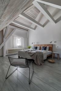 Postel nebo postele na pokoji v ubytování Boutique hotel Mezi plutky