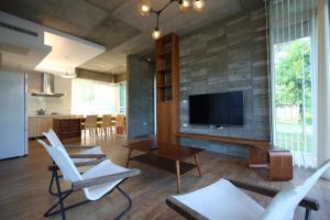 TV a/nebo společenská místnost v ubytování Chuying Sunrise B&B