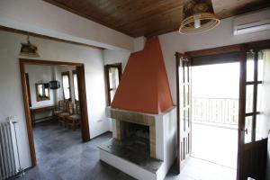 Postel nebo postele na pokoji v ubytování Guesthouse Rousis