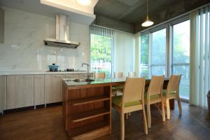 Kuchyň nebo kuchyňský kout v ubytování Chuying Sunrise B&B