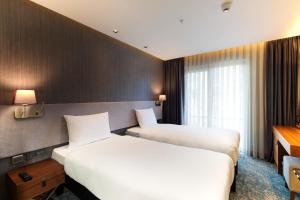 Postel nebo postele na pokoji v ubytování Ibis Styles Istanbul Atasehir + 37 fotografií