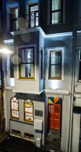 a model of a house with two floors and two doors at GalataCo Hotel in Istanbul