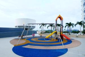 a playground on the side of a cruise ship at One Residence Sekinchan 适耕庄无敌海景 in Sekinchan