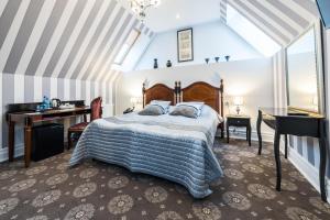 Posteľ alebo postele v izbe v ubytovaní Hotel St. Bruno