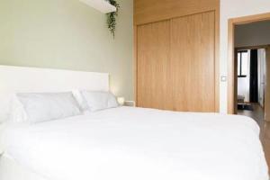 Posteľ alebo postele v izbe v ubytovaní Family apartment Patio&Swimming pool in center Malaga