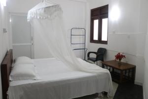 Postel nebo postele na pokoji v ubytování A.V.N HOMESTAY