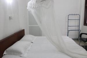Postel nebo postele na pokoji v ubytování A.V.N HOMESTAY