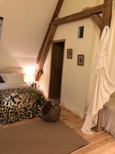 Postel nebo postele na pokoji v ubytování Chateau de Vauchelles