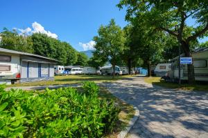 a group of rvs parked at a campsite at bungalow campeggio madonnina in Domaso