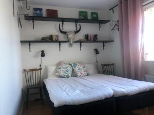 Postel nebo postele na pokoji v ubytování Annex Artilleri + 12 fotografií
