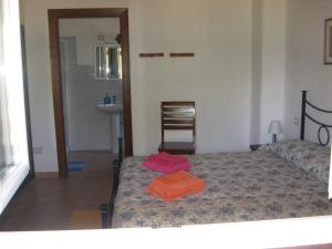 Postel nebo postele na pokoji v ubytování Agriturismo La Barca In Secca