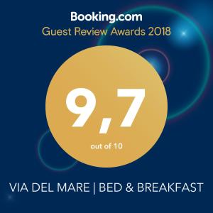 a flyer for a contest reviewing awards with a yellow circle at VIA DEL MARE | BED & BREAKFAST in Lamezia Terme