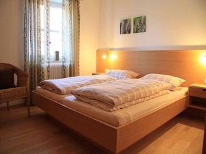 Postel nebo postele na pokoji v ubytování FrongaHOF