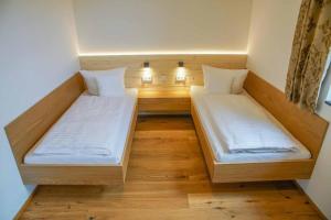 Postel nebo postele na pokoji v ubytování FrongaHOF