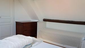 A bed or beds in a room at Villa Audresselles