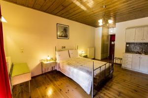 Postel nebo postele na pokoji v ubytování Village Inn