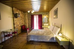 Postel nebo postele na pokoji v ubytování Village Inn