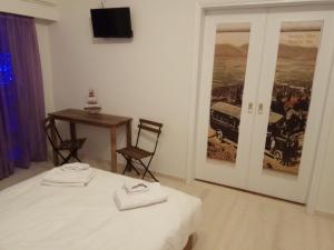 Postel nebo postele na pokoji v ubytování Central Mark-Δωμάτια Διαμερίσματος