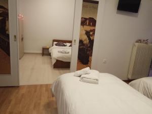 Postel nebo postele na pokoji v ubytování Central Mark-Δωμάτια Διαμερίσματος
