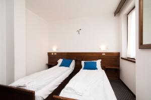Postel nebo postele na pokoji v ubytování Locanda ai Dogi