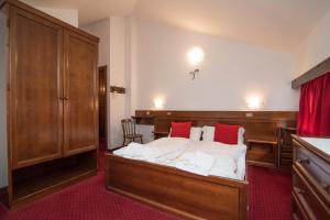 Postel nebo postele na pokoji v ubytování Locanda ai Dogi