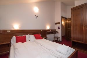 Postel nebo postele na pokoji v ubytování Locanda ai Dogi