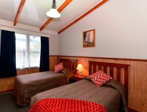Llit o llits en una habitació de Fairy Springs Motel