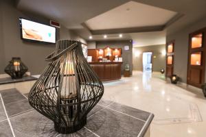 Телевизор и/или развлекательный центр в Mediterranee Family Hotel & Spa
