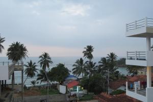 a view of the ocean from a building at Resort Deepika Mirissa in Mirissa