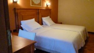 Postel nebo postele na pokoji v ubytování Villa Floreal Hotel Boutique + 26 fotografií
