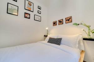Ένα ή περισσότερα κρεβάτια σε δωμάτιο στο San Lorenzo Home