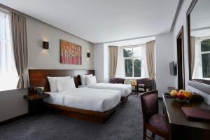 Postel nebo postele na pokoji v ubytování Galway Heights Hotel + 37 fotografií