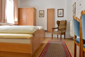 Postel nebo postele na pokoji v ubytování Hotel Bezold
