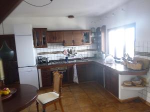 A kitchen or kitchenette at Casa La Lachita
