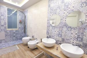 Kylpyhuone majoituspaikassa Vacuna Pleasant Rooms