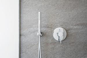 a pair of headphones on the floor of a room at Haus-Ascot-Zermatt in Zermatt +37 photos