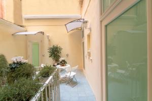 Patio alebo iná vonkajšia časť ubytovania NapulitanDream