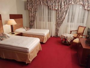 Postel nebo postele na pokoji v ubytování Eurohotel