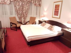 Postel nebo postele na pokoji v ubytování Eurohotel