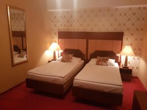 Postel nebo postele na pokoji v ubytování Eurohotel
