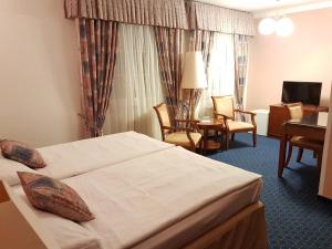 Кровать или кровати в номере Eurohotel