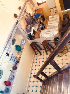 an overhead view of a room with a tub in a kitchen at tamazirt surf house in Taghazout