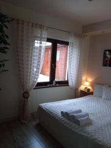 Łóżko lub łóżka w pokoju w obiekcie Apartament wSPAniały.