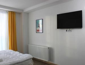 TV a/nebo společenská místnost v ubytování New Gudauri Flat near Gondola Loft 2
