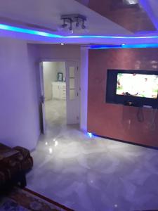 A television and/or entertainment centre at Appartement Akid Lotfi Oran