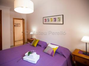 Postel nebo postele na pokoji v ubytování Apartamentos Obelisc