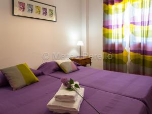 Postel nebo postele na pokoji v ubytování Apartamentos Obelisc